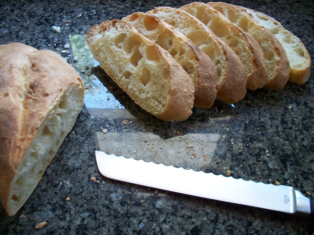 Slicing Rustic Bread Loaf