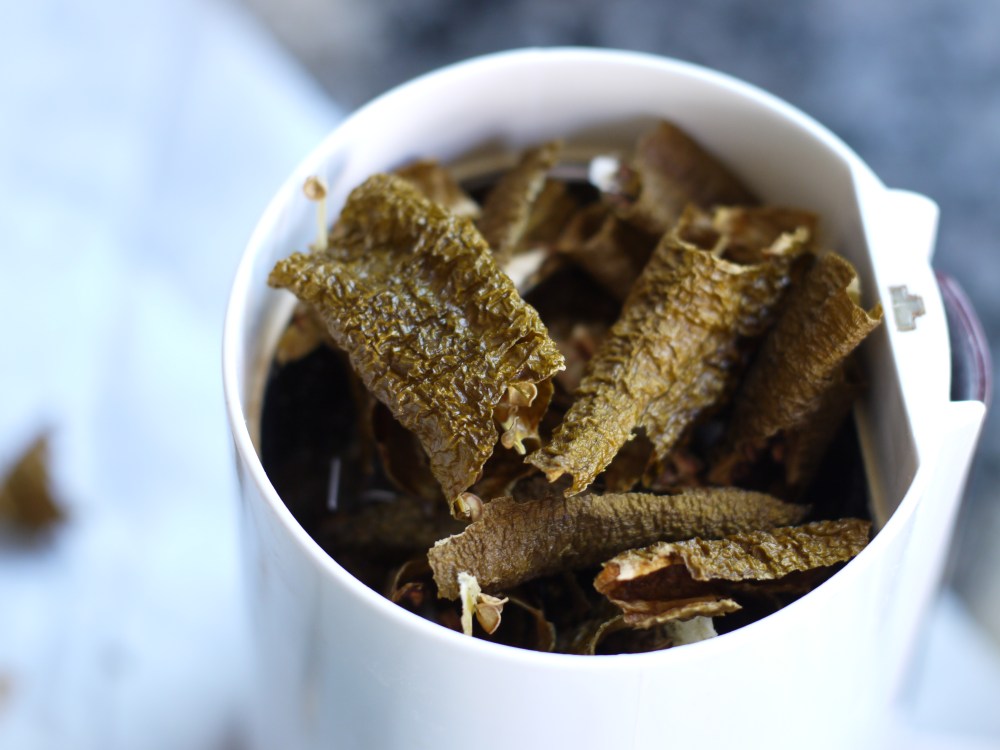 Grinding Dried Green Cowhorn Peppers